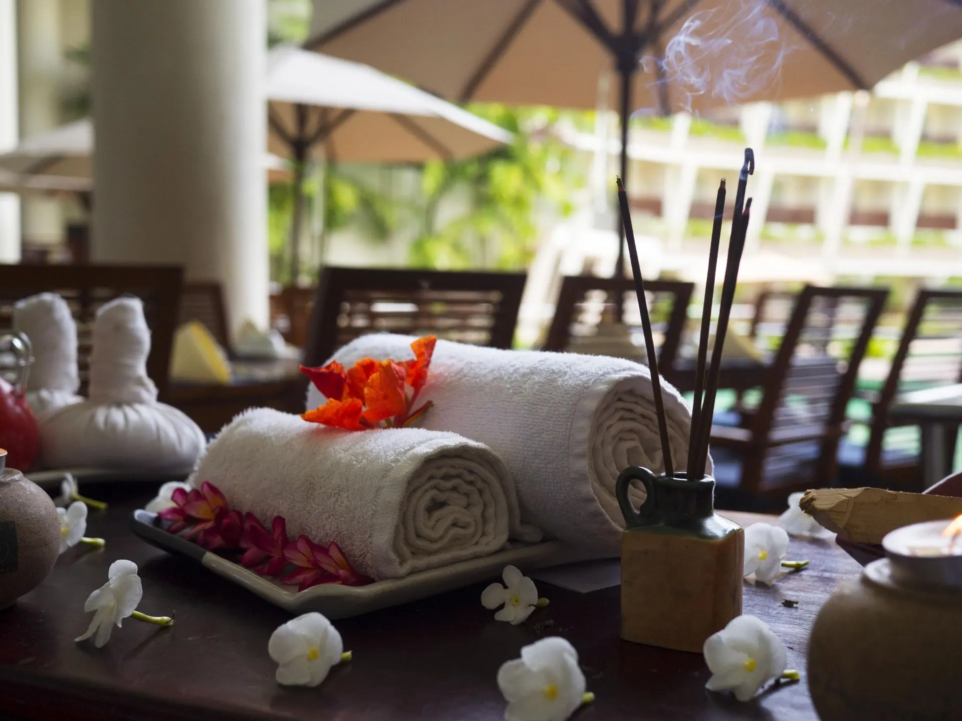 Rolled white towels prepared in a spa